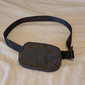 lululemon athletica Charcoal Belt Bag with little signs of wear on front